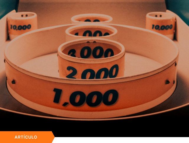 Portada de artículo que muestra un juego de puntería con anillos de puntuación (1,000 a 10,000), con etiqueta naranja de ARTÍCULO en la esquina inferior.